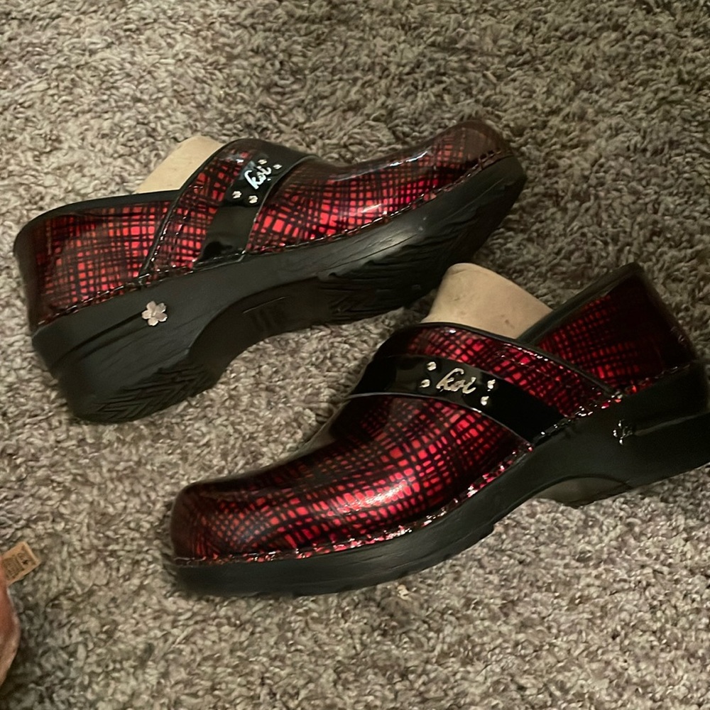 Red Santa clogs, almost new condition , worn a few times
